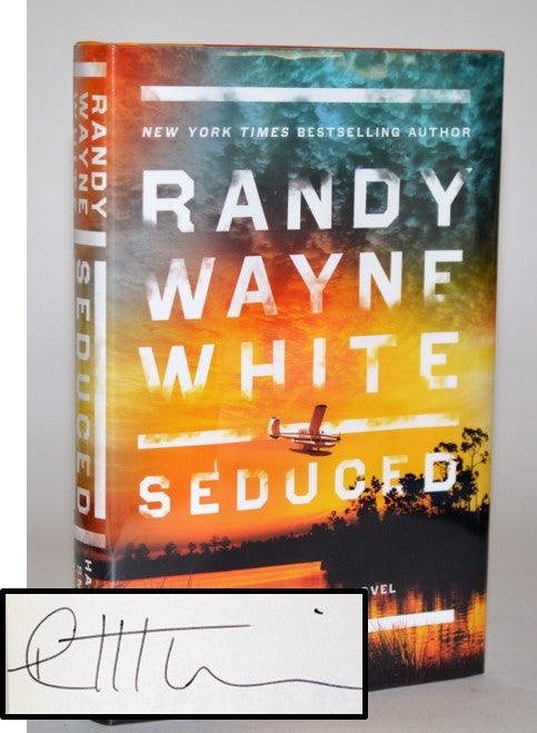 Item #011015 Seduced (Hannah Smith Novel #4). Randy Wayne White.