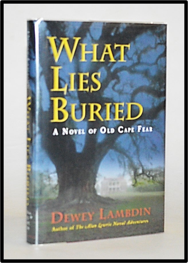 Item #012960 What Lies Buried: A Novel of Old Cape Fear. Dewey Lambdin.